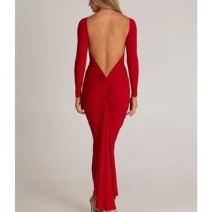 Red low cut back dress by Melani The Label